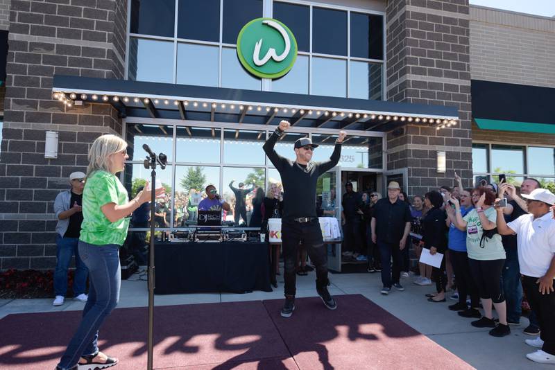 St. Charles Mayor Lora Vitek introduces Donnie Wahlberg and the rest of New Kids on the Block during the Wahlk of Fame Ceremony for New Kids on the Block at the Wahlburgers in St. Charles on Saturday, June 18, 2022.