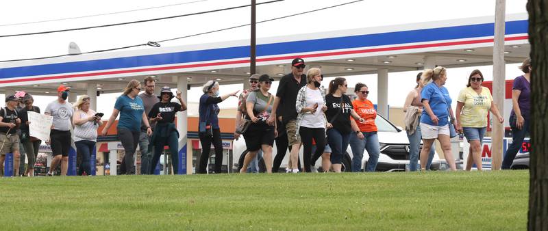 Protesters chant as they march south on Sycamore Road in DeKalb Saturday, June 11, 2022, during a March For Our Lives event which kicked off at Hopkins Park in DeKalb. The March For Our Lives initiative advocates for, among other things, an end to gun violence, updated gun control legislation and policy targeting gun lobbyists.