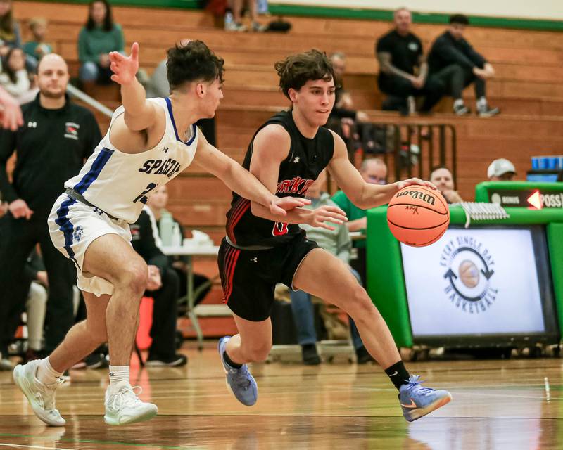 Yorkville's Gabe Sanders (0) drives past the defense during their Jack Tosh Holiday Classic basketball tournament game between St Francis at Yorkville Thursday Dec 26, 2024 in Elmhurst.
