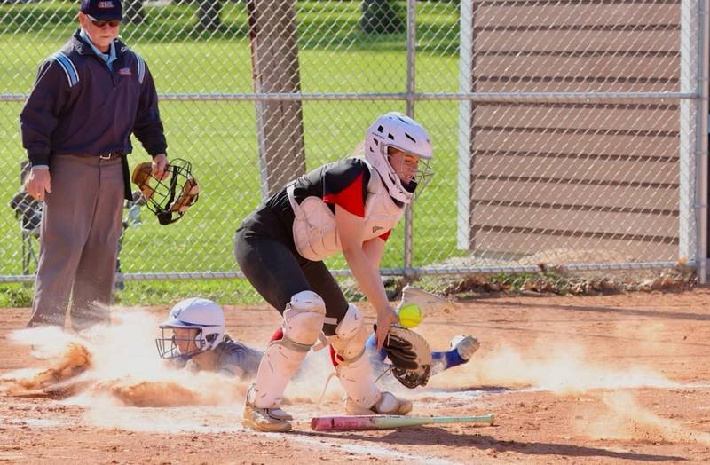 Hall catcher Caroline Morris Thursday in Spring Valley.