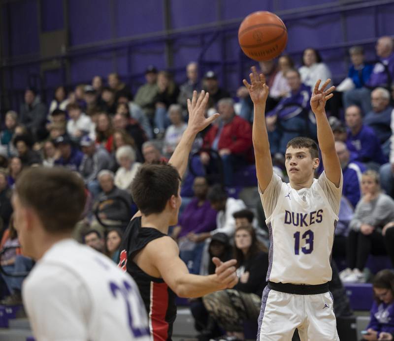 Dixon’s Cullen Shaner puts up a three point shot against Stillman Valley Thursday, Dec. 14, 2023 at Dixon High School.