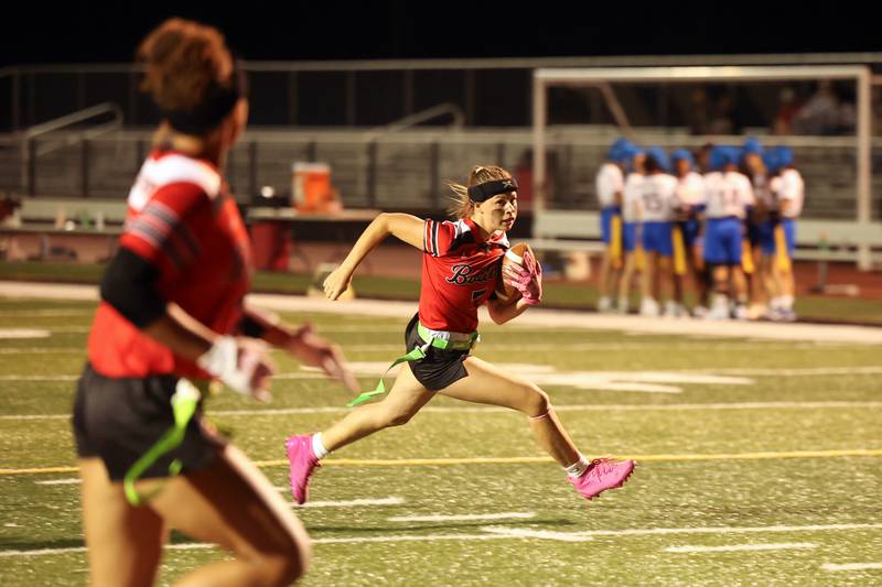 Bradley-Bourbonnais' Elise Munsterman runs the ball during the Boilermakers' 60-7 victory over Joliet Central in the season opener on Aug. 25, 2025.
