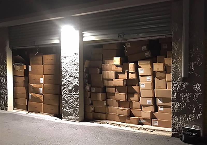 Stolen retail goods are pictured in a storage unit at an unspecified location before being seized by the state attorney general's office.