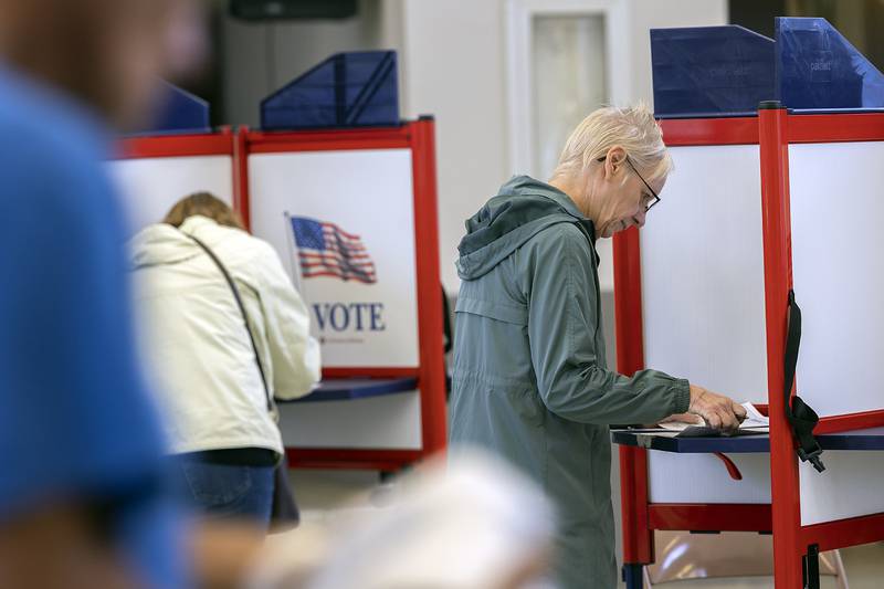 Nancy Ruggles fills out her ballot Tuesday, Nov. 5, 2024, at the Rock Falls Community Center. Election judges were happy to see large numbers of voters coming out.
