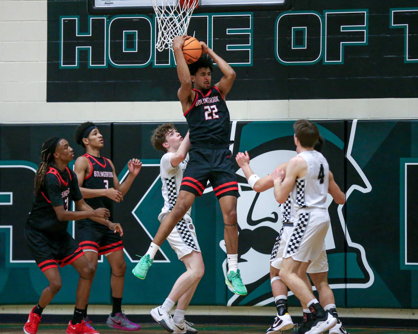 Bolingbrook's Joshua Pettigrew (22) grabs a rebound during their Jack Tosh Holiday Classic basketball tournament Championship game between Fenwick at Bolingbrook. Tuesday Dec 31, 2024 in Elmhurst.