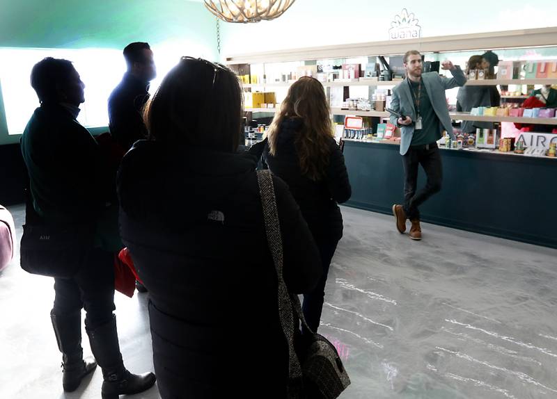 Zachary Edgerton, the general manager of the Ivy Hall Crystal Lake, gives a tour during an open house Thursday, Feb. 2, 2023, at the social equity-licensed marijuana dispensary that recently opened at 501 Pingree Road in Crystal Lake.