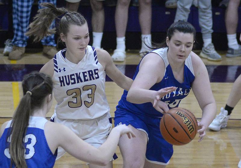 Serena’s Jenna Setchell knocks the ball away from Hinkley Big Rock’s Devin Werner 2nd period during the Class 1A Sectional on Tuesday, Feb. 21, 2023 at Serena High School.