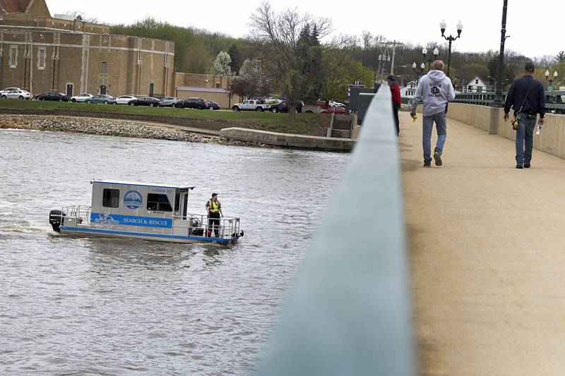 Search squads check the Rock River in Dixon Tuesday, April 14, 2026, after an individual jumped over the railing off of the Peoria Avenue Bridge late Monday night.