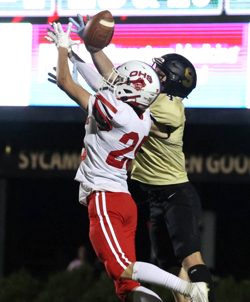 Ottawa's Michael McGill breaks up a pass intended for Sycamore's Aidan Wyzard during their game Friday, Sept. 27, 2024, at Sycamore High School.
