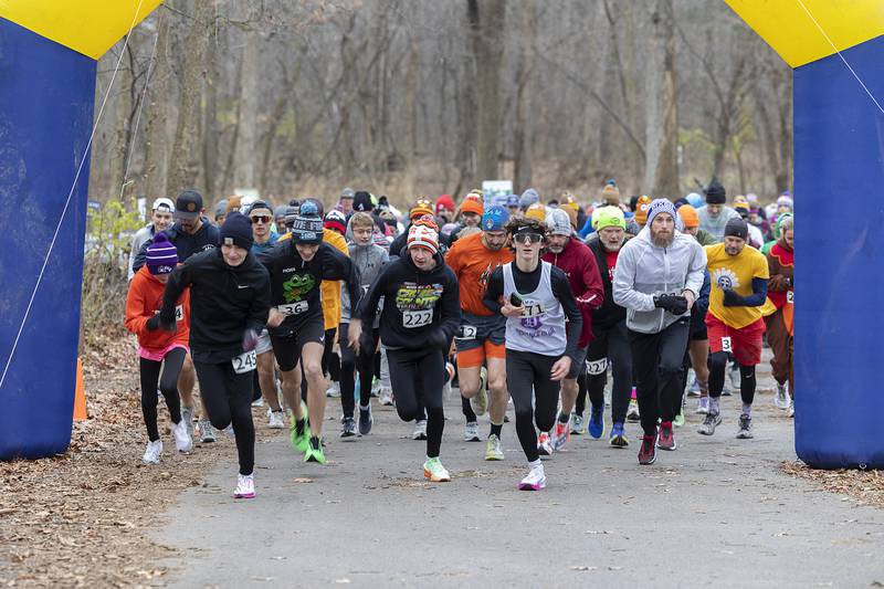 260 participants fire off the starting line Thursday, Nov. 28, 2024, for the start of St. Anne’s Turkey Trot 5K.