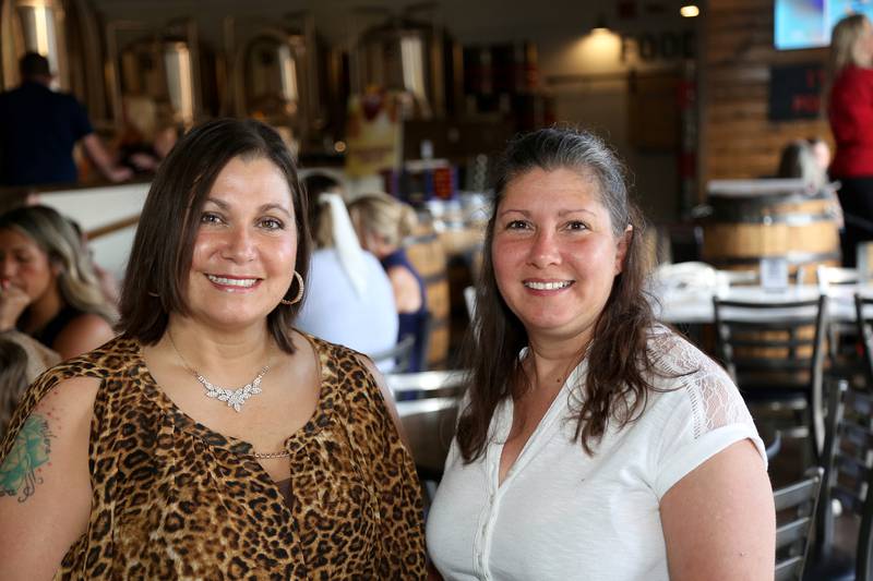 Sandra and Valerie Taormina (Why Knot Massage) pose for a photo on Wednesday, June 25, 2025.