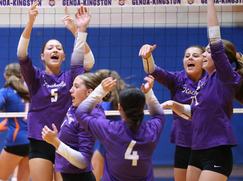 Rochelle players celebrate a point during their match Monday, Sept. 15, 2025, at Genoa-Kingston High School.
