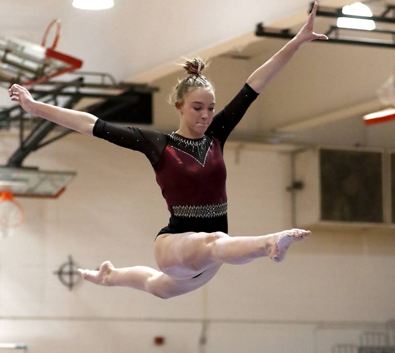 Prairie Ridge’s Bryleigh Cooper competes on the balance beam during the IHSA Mundelein Gymnastics Sectional on Feb. 13, 2025, at Mundelein High School.