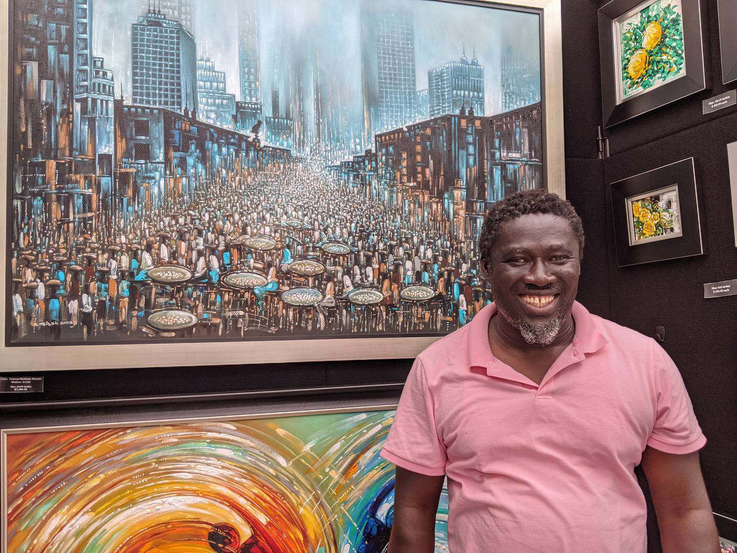 Kwame Boama Mensa-Aborampa de Bolingbrook exhibió sus pinturas acrílicas en la exhibición.  Nació en el país de África occidental de Ghana.