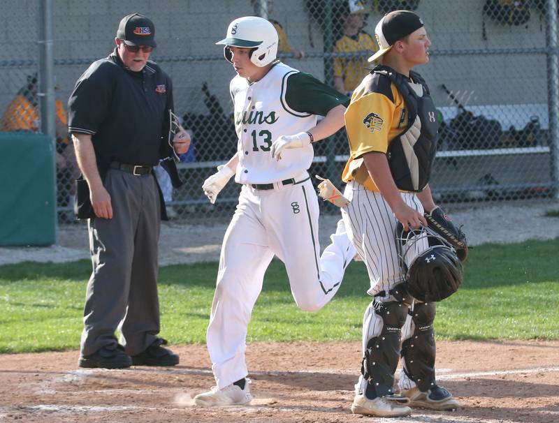 St. Bede's Alex Ankiewcz scores a run against Putnam County on Tuesday, April 30, 2024 at St. Bede Academy.