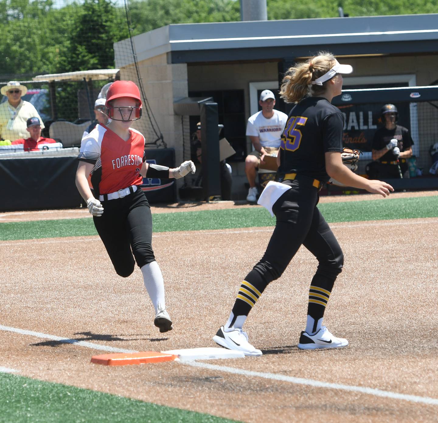 Forreston's Alaina Miller beats out an infield hit during action against Casey-Westfield in the 1A semifinal game on Friday, June 3 in Peoria.
