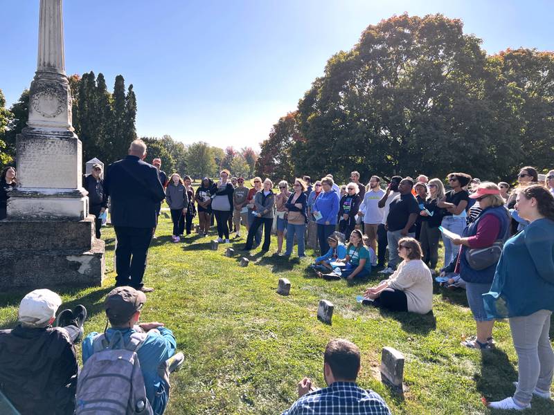 Dozens gathered on Oct. 6, 2024 to listen to the stories, regaled by members of the Sons of Union Veterans of the Civil War,  of some of the people who were buried at Elmwood Cemetery.