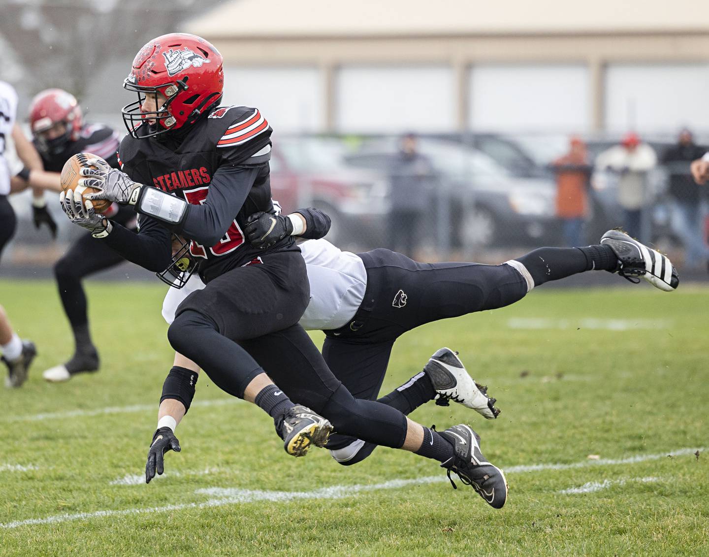 Fulton’s Dom Kramer hauls in a catch Saturday, Nov. 12, 2022 in a quarterfinal game against Le/Win.
