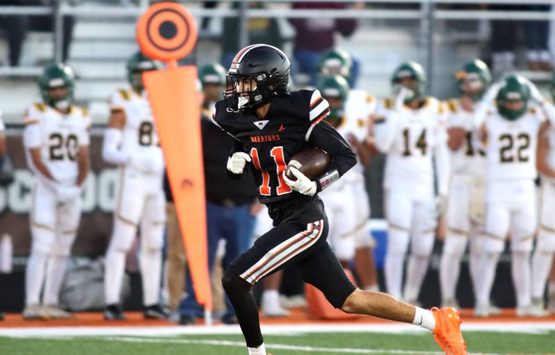 McHenry’s Haydn Schmidt breaks free for an early touchdown against Crystal Lake South in varsity boys football at McCracken Field on the campus of McHenry High School in McHenry on Friday, Sept. 5, 2025.