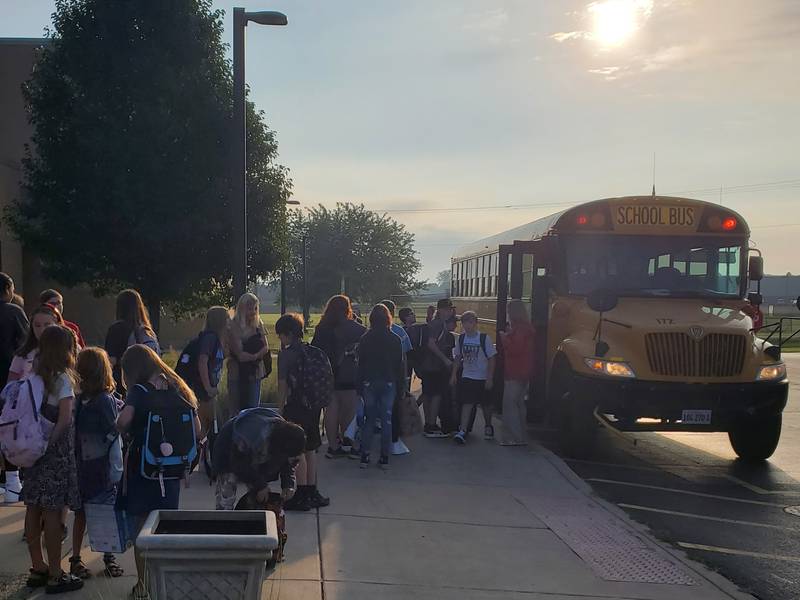 With full backpacks and smiles, students arrive at Putnam County Primary School on Monday.