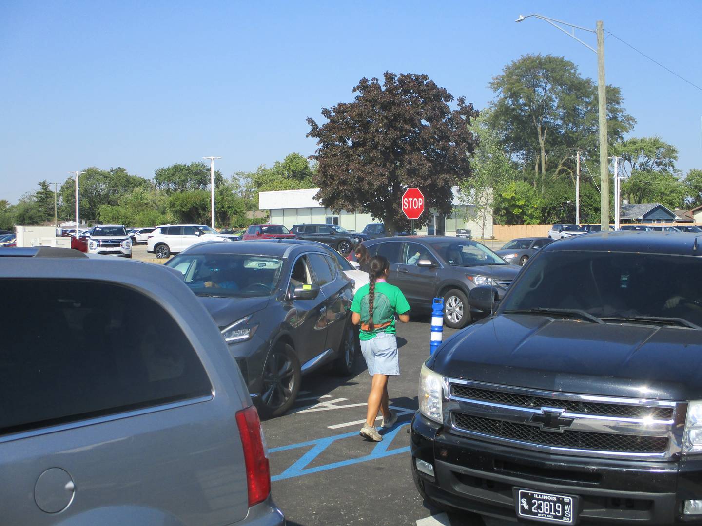 Cars creep up to the drive-thru at the new 7 Brew in Joliet after waiting in a line that stretched nearly the entire length of Barney Avenue on Saturday. Oct. 4, 2025