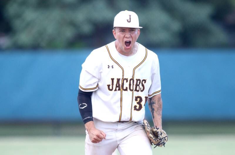 Jacobs’ Anthony Edge howls with delight after securing a third out in the sixth inning in Class 4A Sectional baseball action at Carpentersville Wednesday.