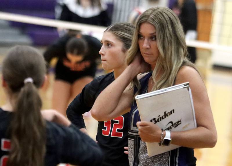 Huntley’s Head Coach Karen Naymola, right, and Izzy Whitehouse prepare to face Hampshire in varsity girls volleyball at Hampshire High School in Hampshire on Tuesday, Sept. 23, 2025.