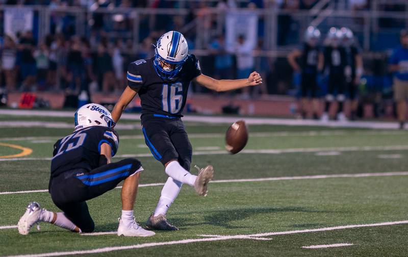 St. Charles North's Hunter Liszka (16) attempts a field goal kick against Lake Zurich during a football game at St. Charles North High School on Friday, Sep 2, 2022.