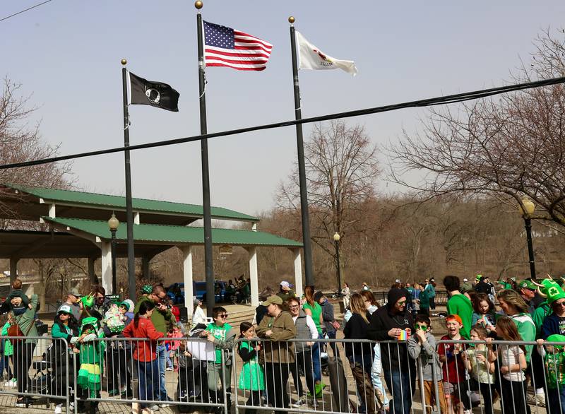 People line up in anticipation of the St. Patrick's Day Parade in Yorkville on Saturday, March 15, 2024.