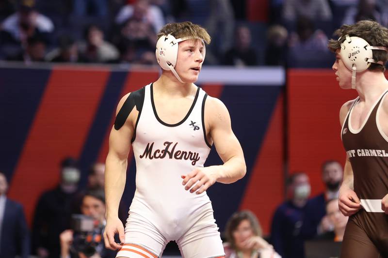 McHenry’s Chris Moore waits for the match to resume against Mt. Carmel’s Colin Kelly in the Class 3A 160lb. championship match at State Farm Center in Champaign. Saturday, Feb. 19, 2022, in Champaign.
