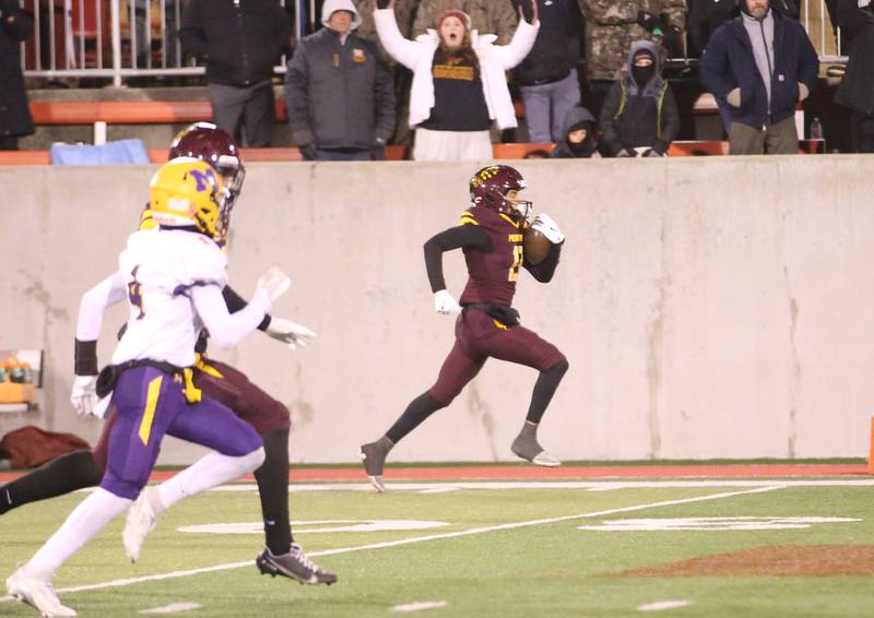 Montini Catholic's CJ Harkins sprints down the sideline to score a touchdown against Monticello during the Class 3A State football championship on Friday, Nov. 29, 2024 at Hancock Stadium in Normal.