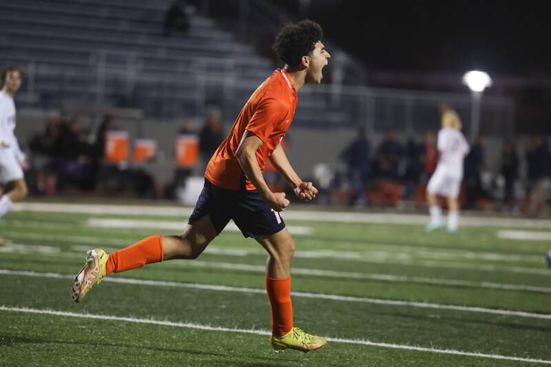 Romeoville’s Isaiah Pina celebrates a goal against Edwardsville during the 2022 Class 3A Bloomington Super-Sectional.y.