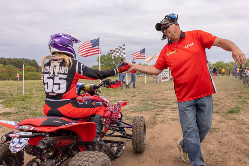 Starting gate operator Doug Hanabarger greeted many riders at the gate with a high five to wish them luck and calm their nerves pre-race during the ATVMX Championship race on May 24, 2025 at Sunset Ridge MX in Walnut.