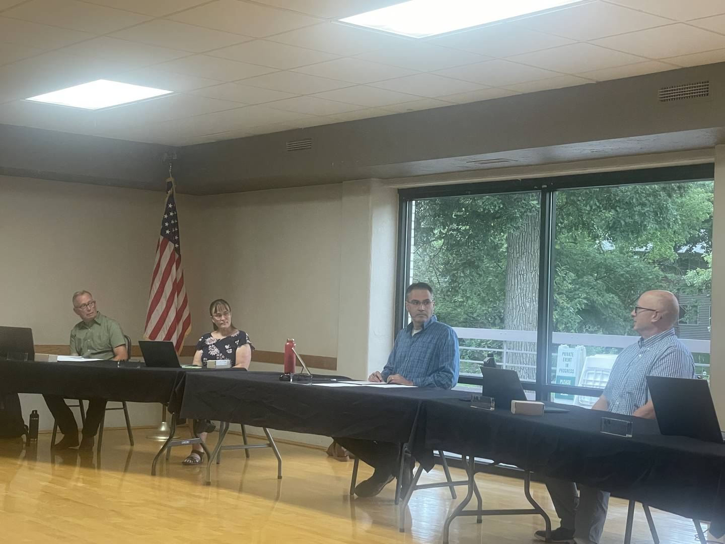 Members of the DeKalb Park Board get briefed Thursday, July 17, 2025, on where plans for Hopkins Pool stand.