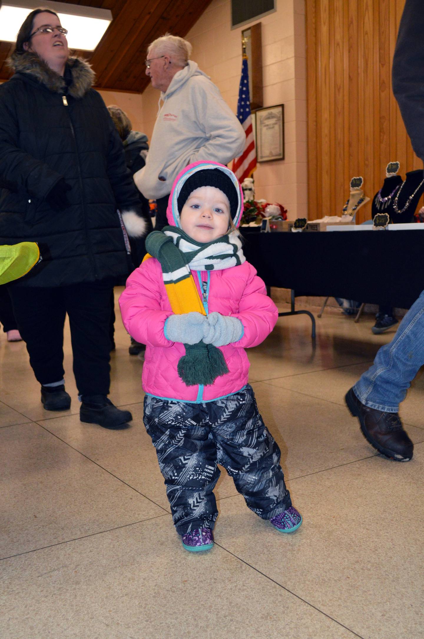 Teagan Rubright, 2, of Davis, is bundled up against the bitter cold, even while inside. Teagan and her family attended Leaf River's Christmas market in the Bertolet Building on Dec. 17. The event was part of Leaf River's Christmas festival.