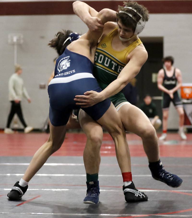 Crystal Lake South’s Nathan Randle tries to takedown Cary-Grove’s Ignacio Santander in a 132-pound semifinal match of the IHSA 2A Antioch Wrestling Regional on Saturday, Feb. 8, 2025, at Antioch High School.