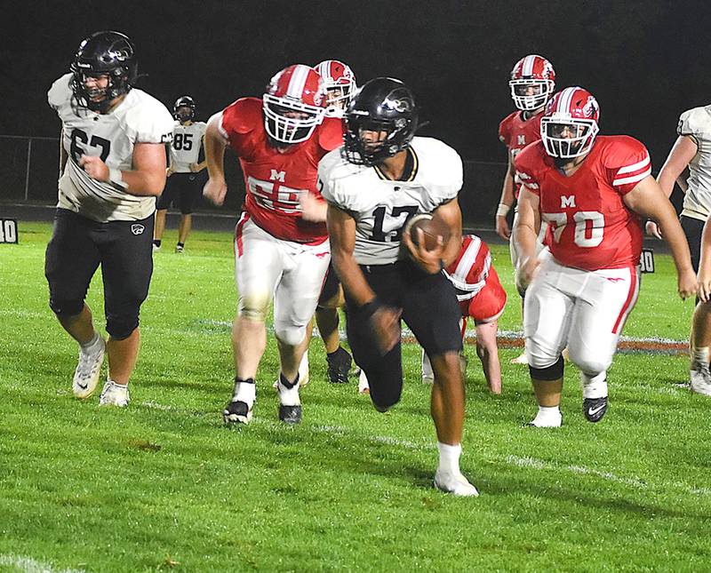Lena-Winslow's Jaylen Rakowska (17) breaks away from Morrison defenders on Friday, Aug. 30, 2024. The Mustangs lost the season opener to the Panthers 32-6.