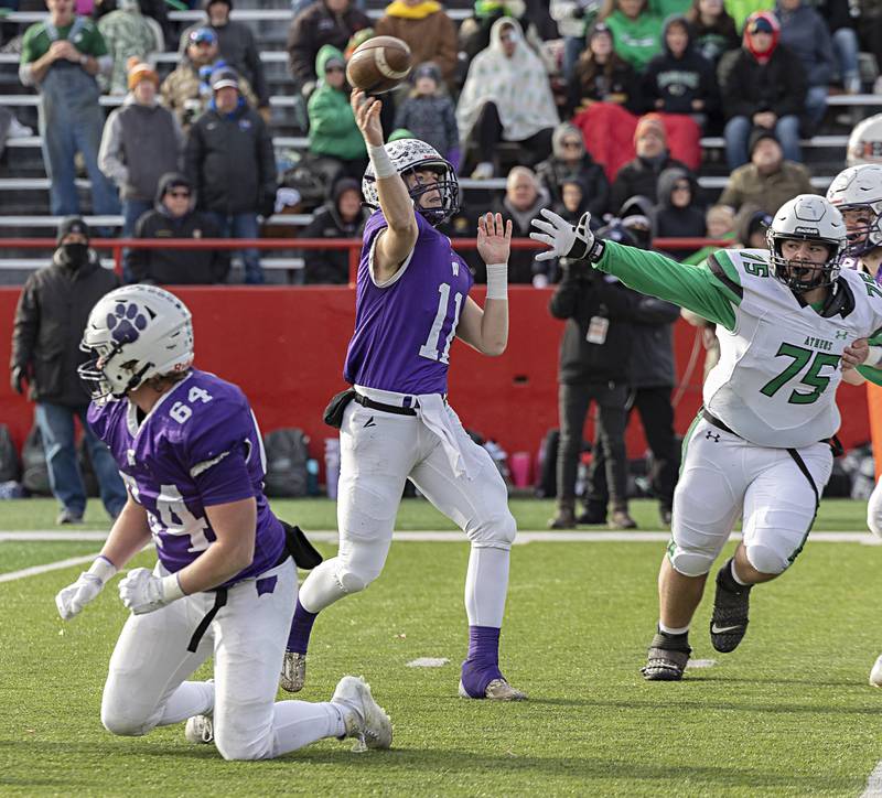 Wilmington's Cade McCubbin fires a pass against Athens Friday, Nov. 24, 2023 in the 2A state football championship game at Hancock Stadium in Normal.