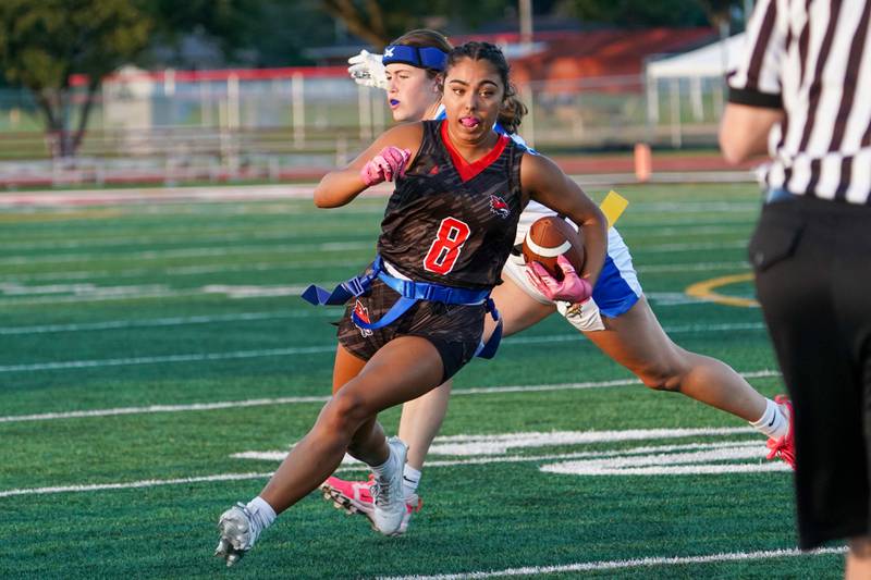 Yorkville's Bella Esquivel (8) runs after the catch against Geneva during a non-conference game at Yorkville High School on Tuesday, Sept. 2, 2025.
