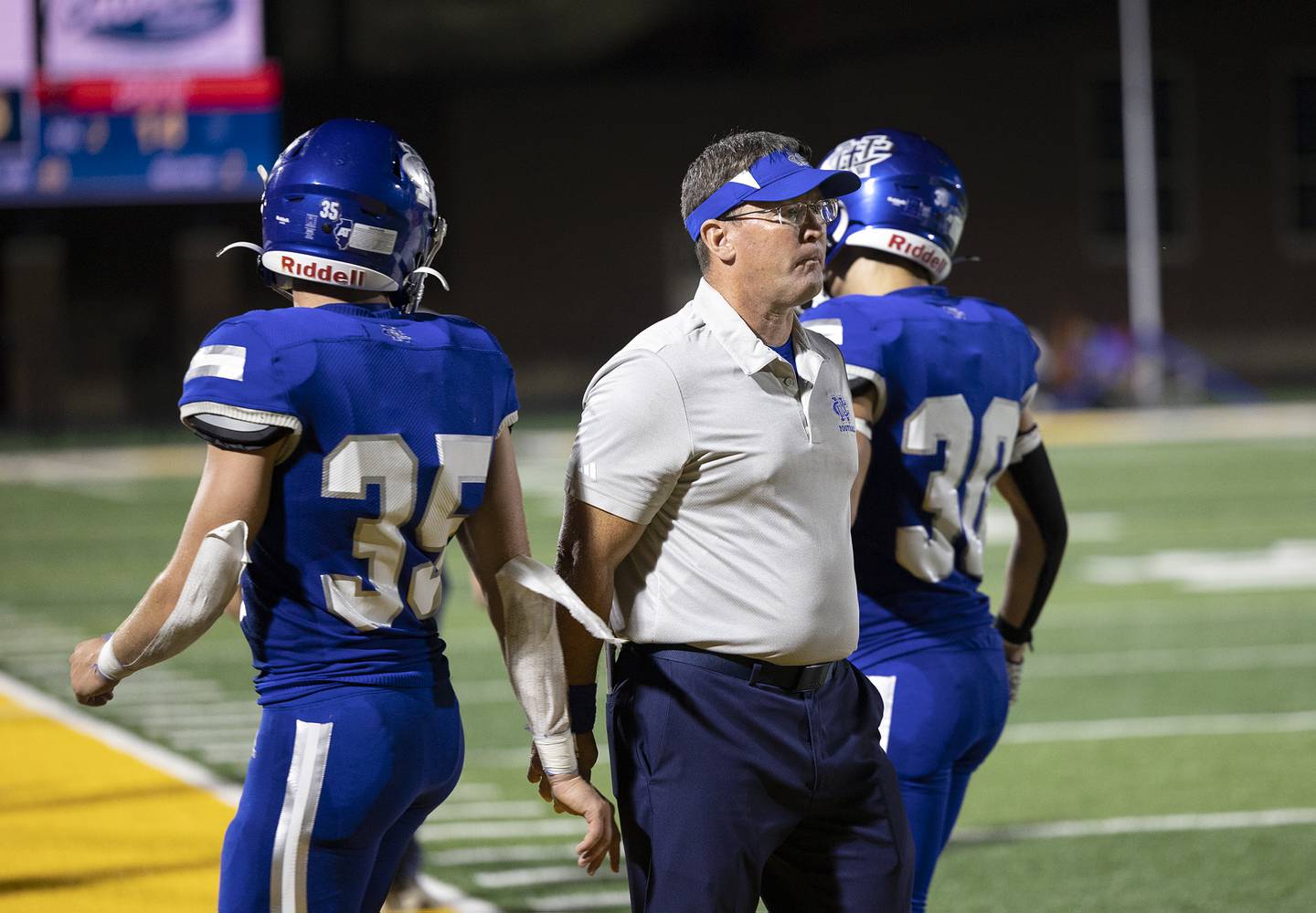 Newman special teams coach Todd Messer celebrates a touchdown with his team Friday, Sept. 20, 2024, at Roscoe Eades Stadium in Sterling.