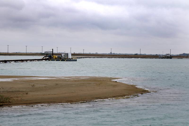 The dredging operation at the Super Aggregates Marengo Lakes mine during the McHenry County Sand and Gravel Mining Tour on Thursday, Oct. 12, 2023. The tour brought McHenry County board members, township and village officials on a four hour trip to visit operating mines on Route 23 in Marengo and to former sites now reclaimed for housing, recreation in Algonquin and Cary.