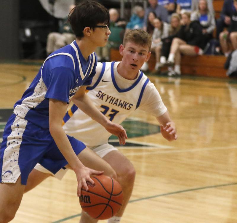 Woodstock's Joesph Nitz tries to drive on Johnsburg's JT Schmitt during the boy’s game of McHenry County Area All-Star Basketball Extravaganza on Sunday, April 13, 2025, at Alden-Hebron’s Tigard Gymnasium in Hebron.