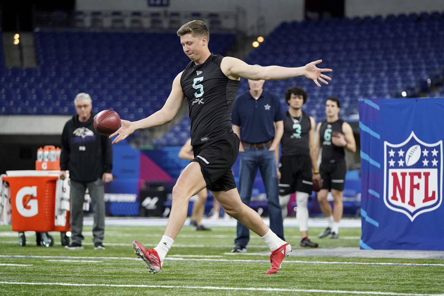 North Carolina State kicker Trenton Gill participates in a drill at the NFL Scouting Combine on March 6, 2022 in Indianapolis.