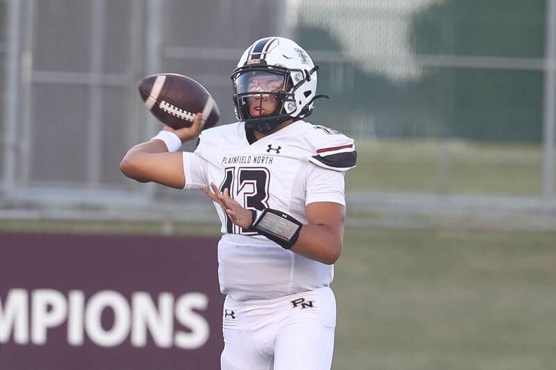 Plainfield North’s Cole Svara passes against Lockport on Friday, August 30, 2024 in Lockport.