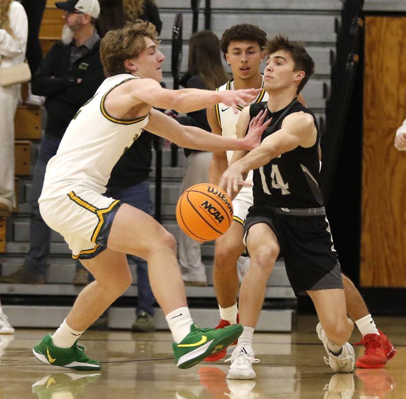 Crystal Lake South's Vincent Santarelli tries to guard Kaneland’s Preston Popovich during the IHSA Class 3A Rochelle Sectional championship basketball game on Friday, March 7, 2025, at Rochelle High School.
