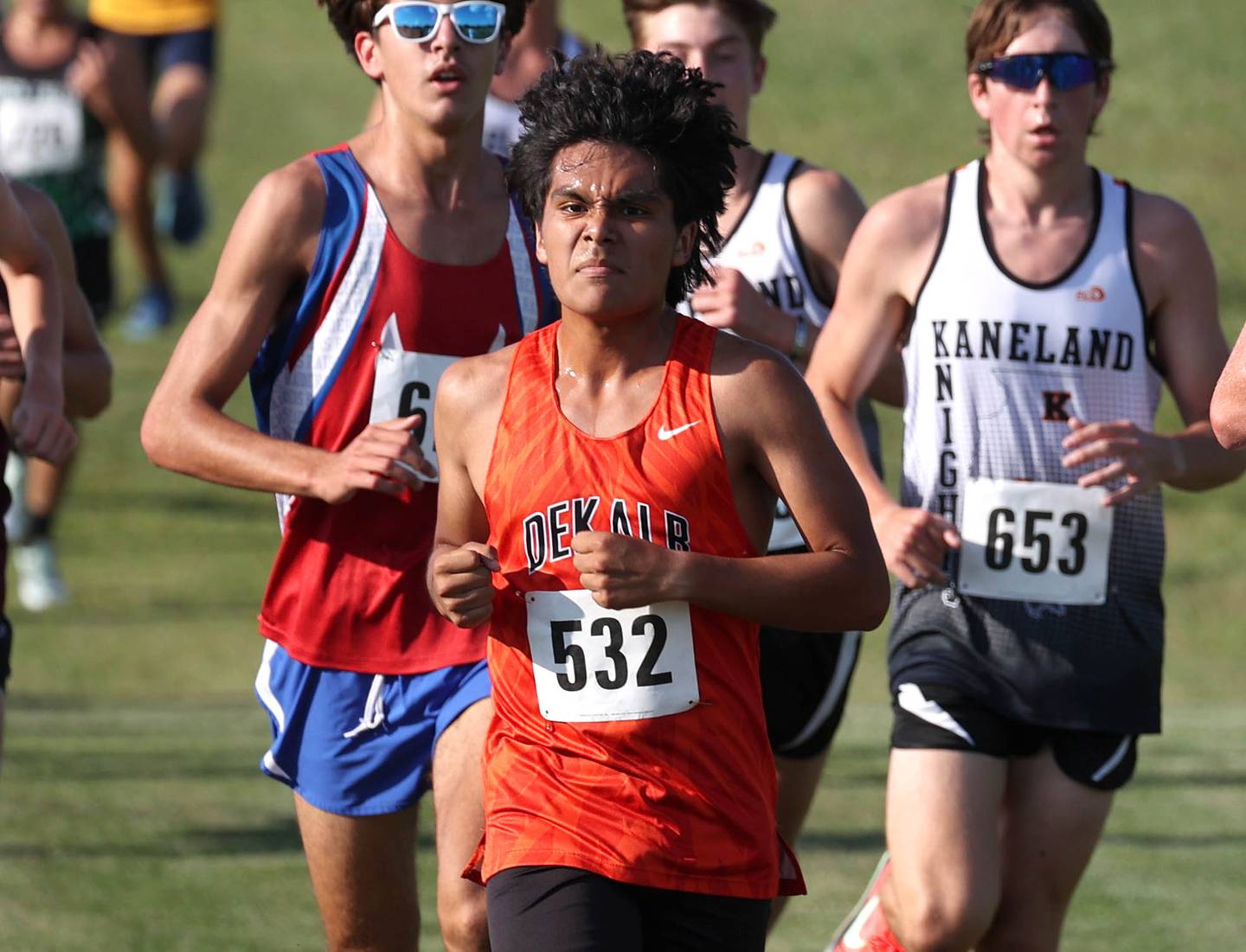 Dekalb’s Andy Duran runs ahead of a pack Tuesday, Sept. 2, 2025, during the Sycamore Cross Country Invitational at Northern Illinois University in DeKalb.