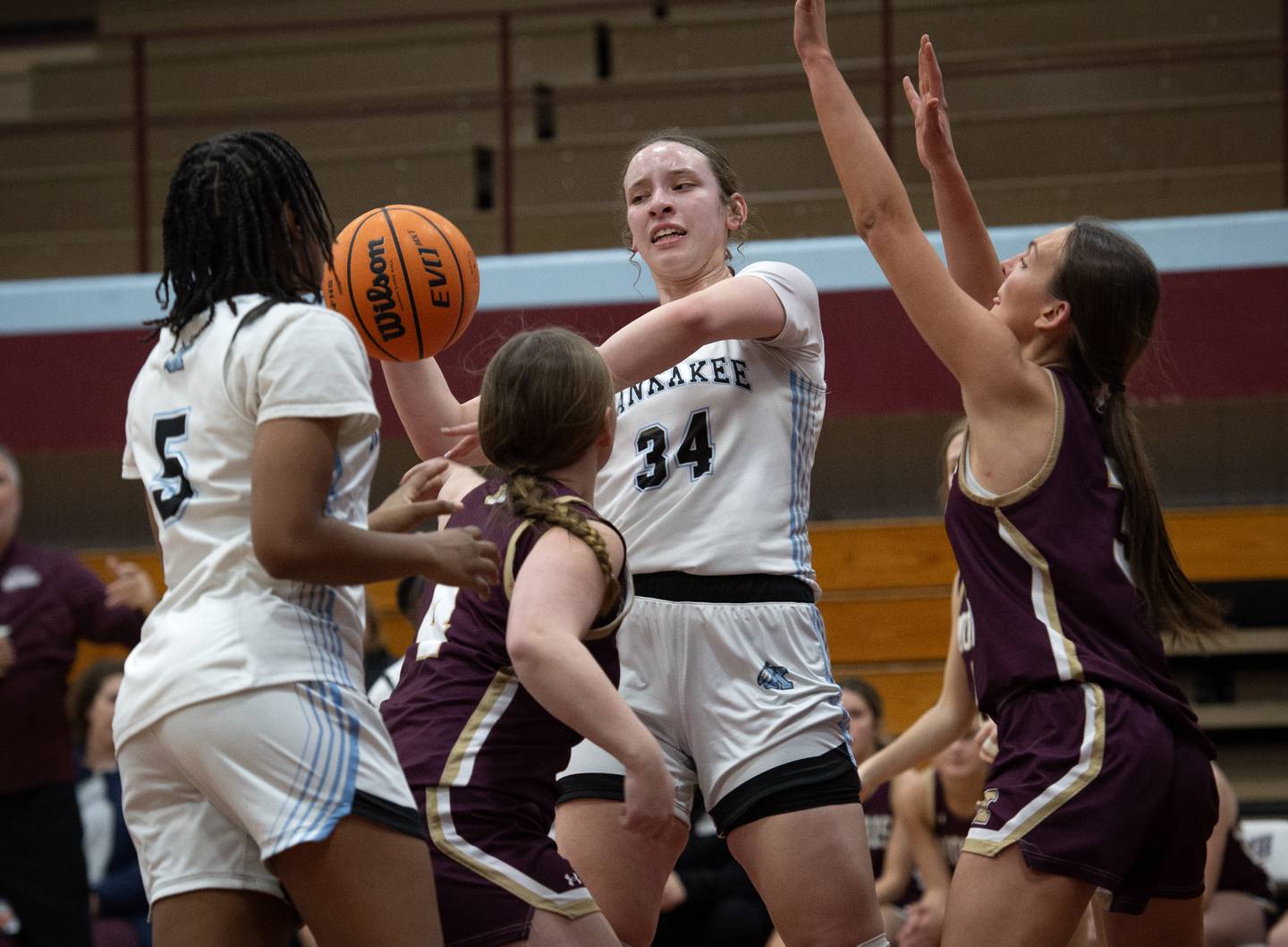 Kankakee's Ava Johnson, center, is pressured by Morris's Brooke Thorson, center, and Lily Hansen, right, in a game on Tuesday, January 27, 2026.