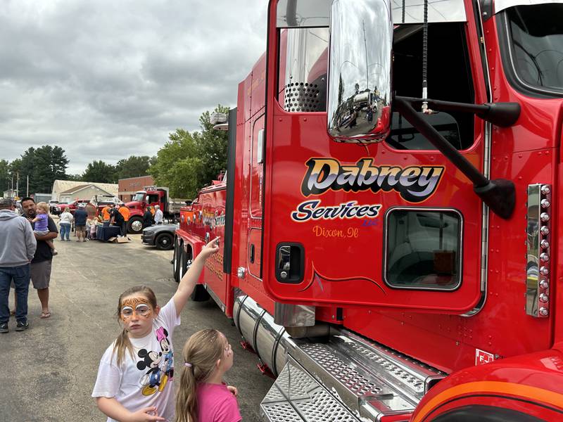 Ainslee and Auden Logan, 8 and 6, of Oregon, check out "Big Jenny," a tow truck owned by Dabney Services Inc. of Dixon, at Oregon's National Night Out on Tuesday, Aug. 6, 2024. The event was hosted by the Oregon Police Department and Oregon Park District at River's Edge Experience.