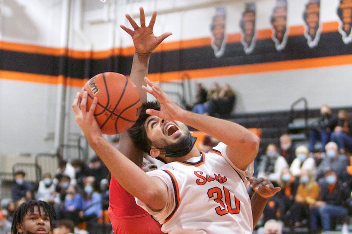 St. Charles East's Rahul Gor goes in for the basket against East Aurora at the 62ND Annual Ron Johnson Thanksgiving Tournament on Nov.22, 2021 in St. Charles.