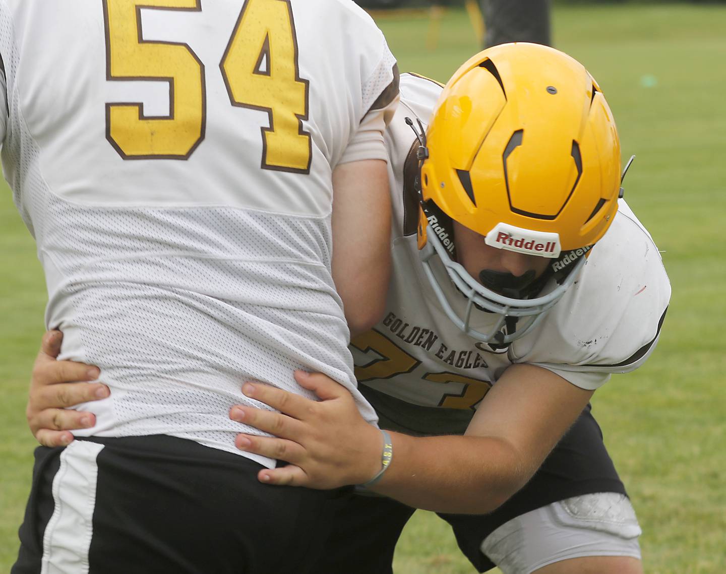 Jacobs’ Vince DeLordo takes part in drill on Tuesday, July 2, 204, during a summer football Patrice at Jacobs High School.